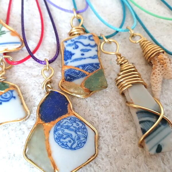 Beautiful ceramic pieces harmoniously joint together with sea glass